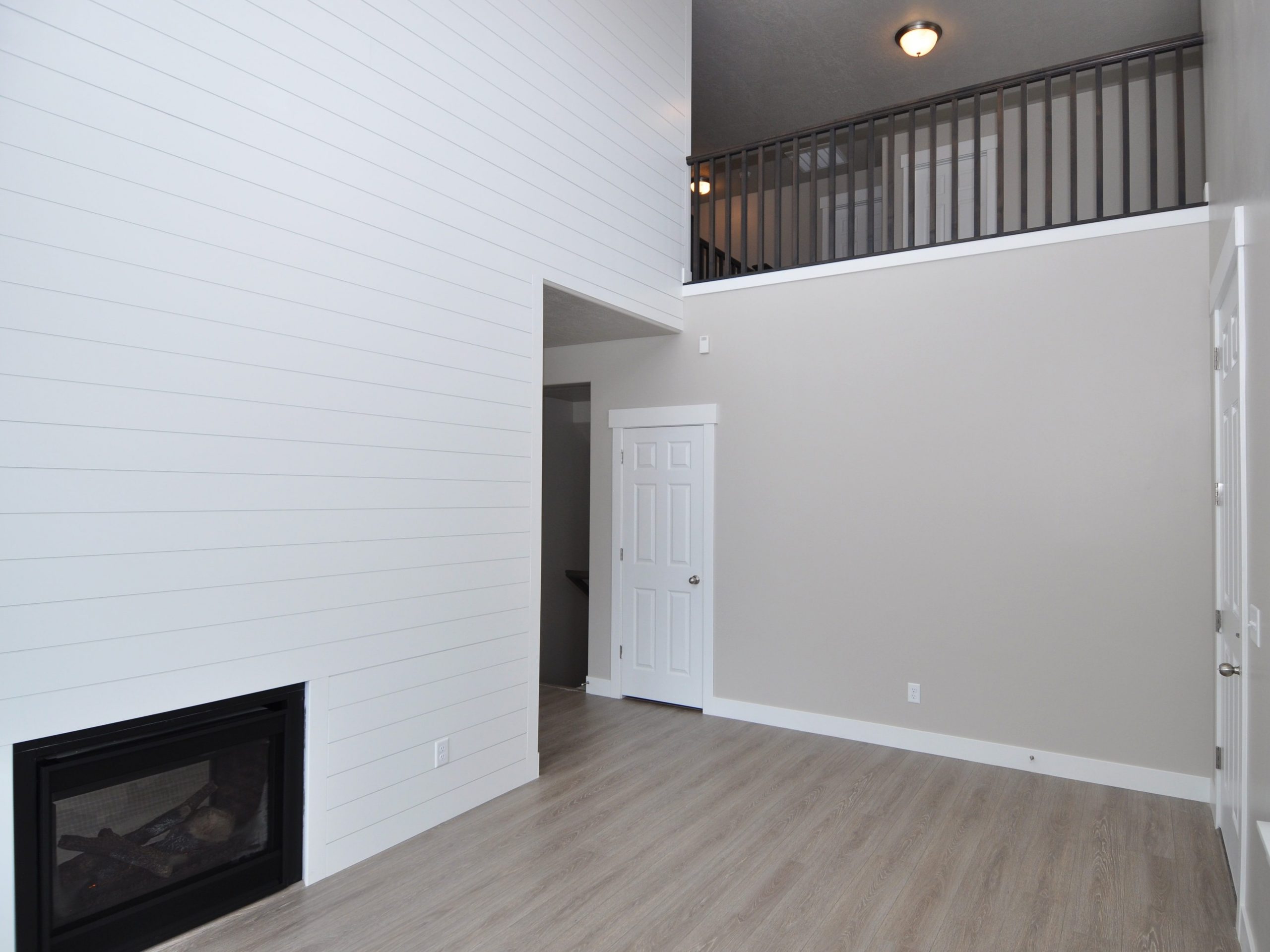 Custom Saratoga Springs 2-Story Vaulted Living Room with Loft Above