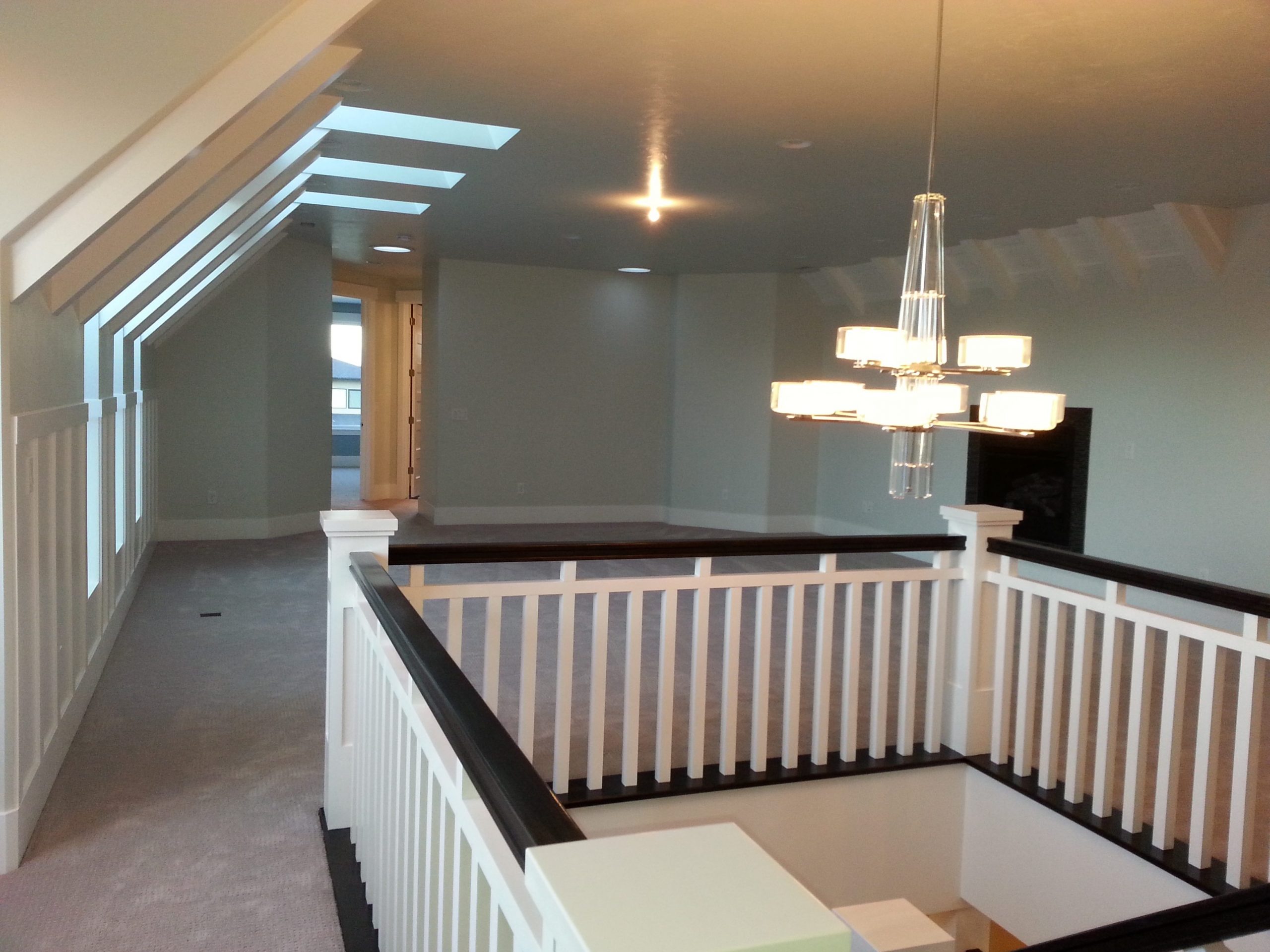 Custom Staircase in Custom Sandy Rambler with Bonus room by Lightyear Homes in Sandy, City, Utah