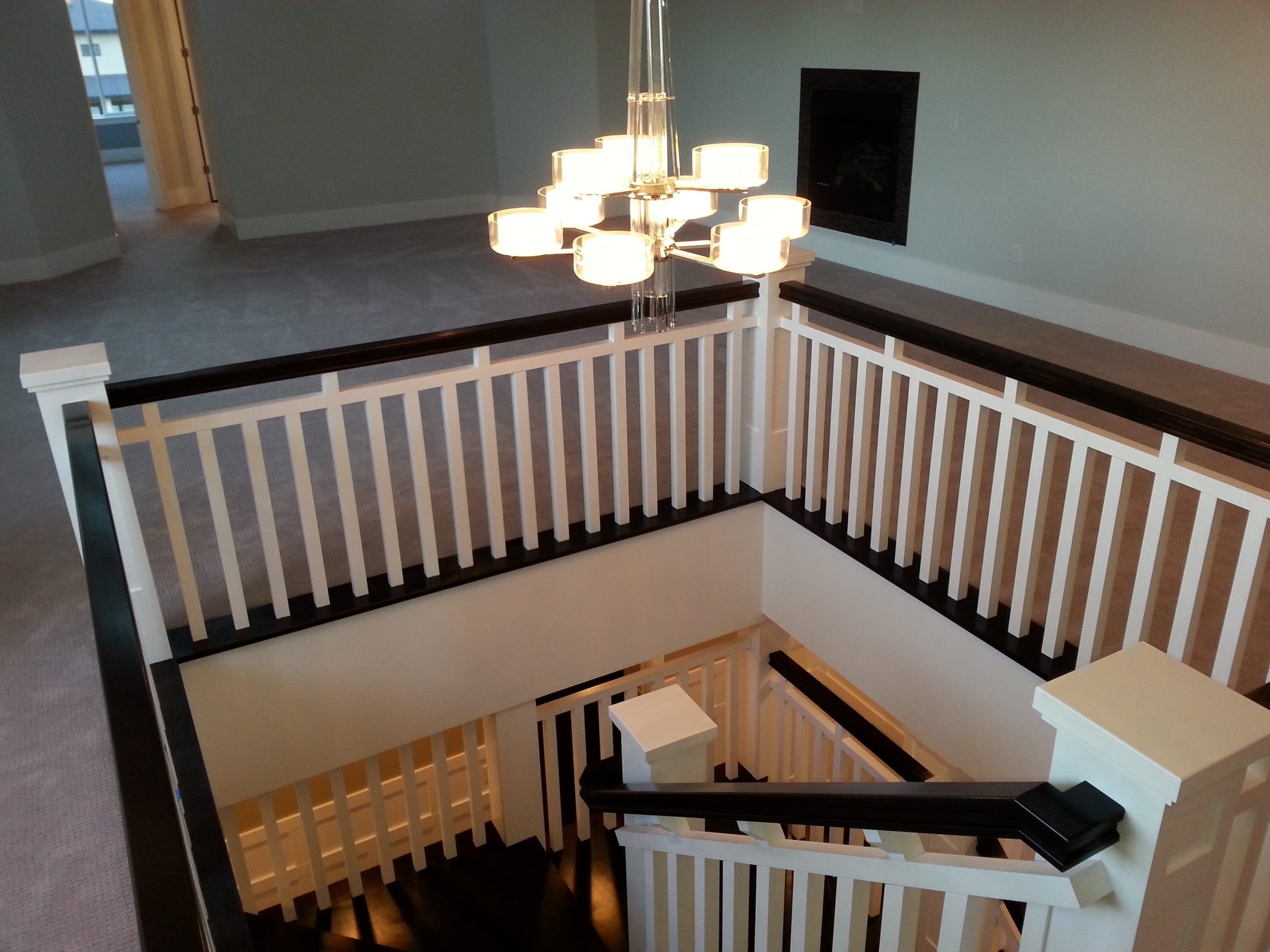 Custom Staircase in Custom Sandy Rambler with Bonus room by Lightyear Homes in Sandy, City, Utah