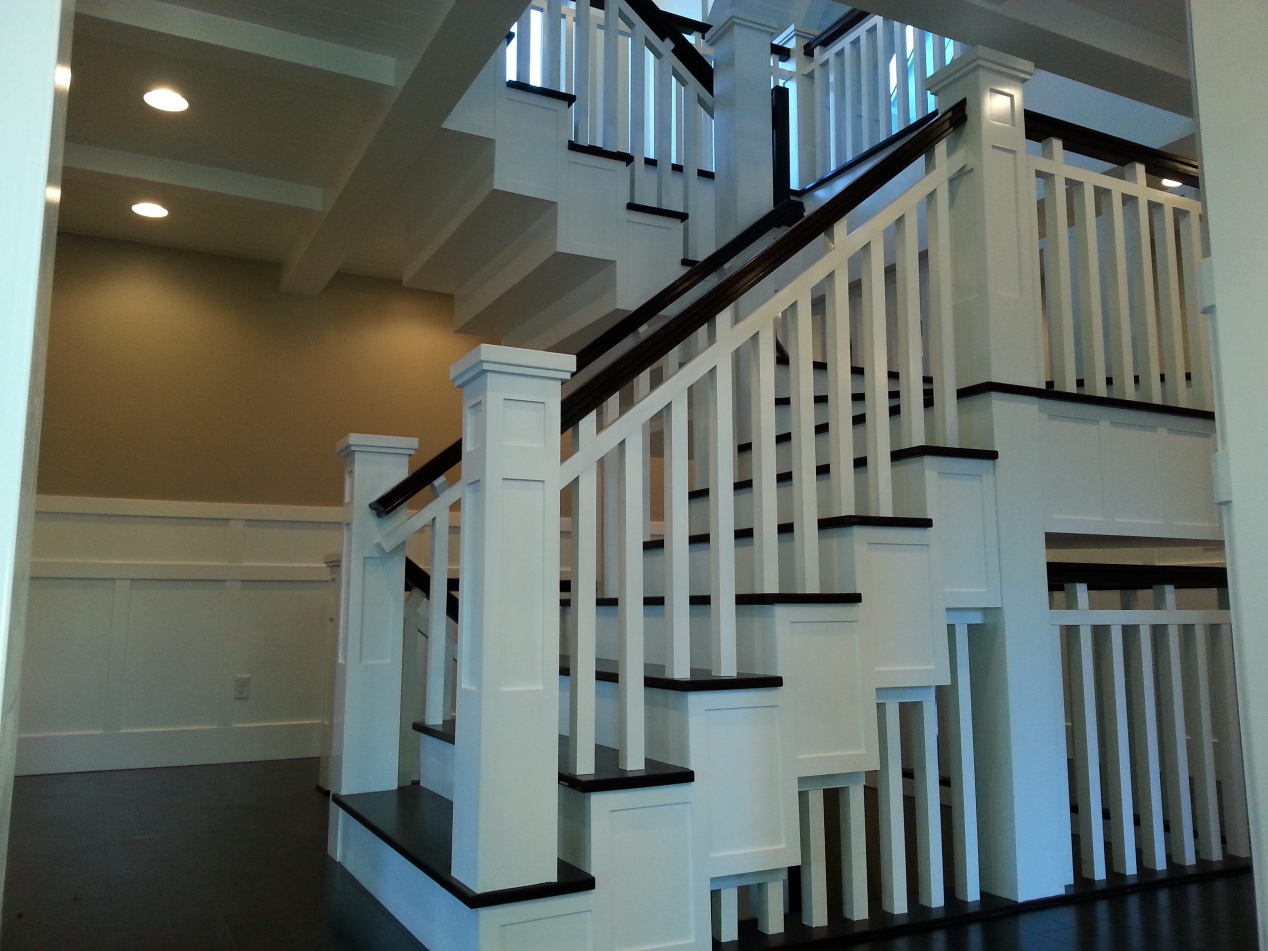 Custom Staircase in Custom Sandy Rambler with Bonus room by Lightyear Homes in Sandy, City, Utah