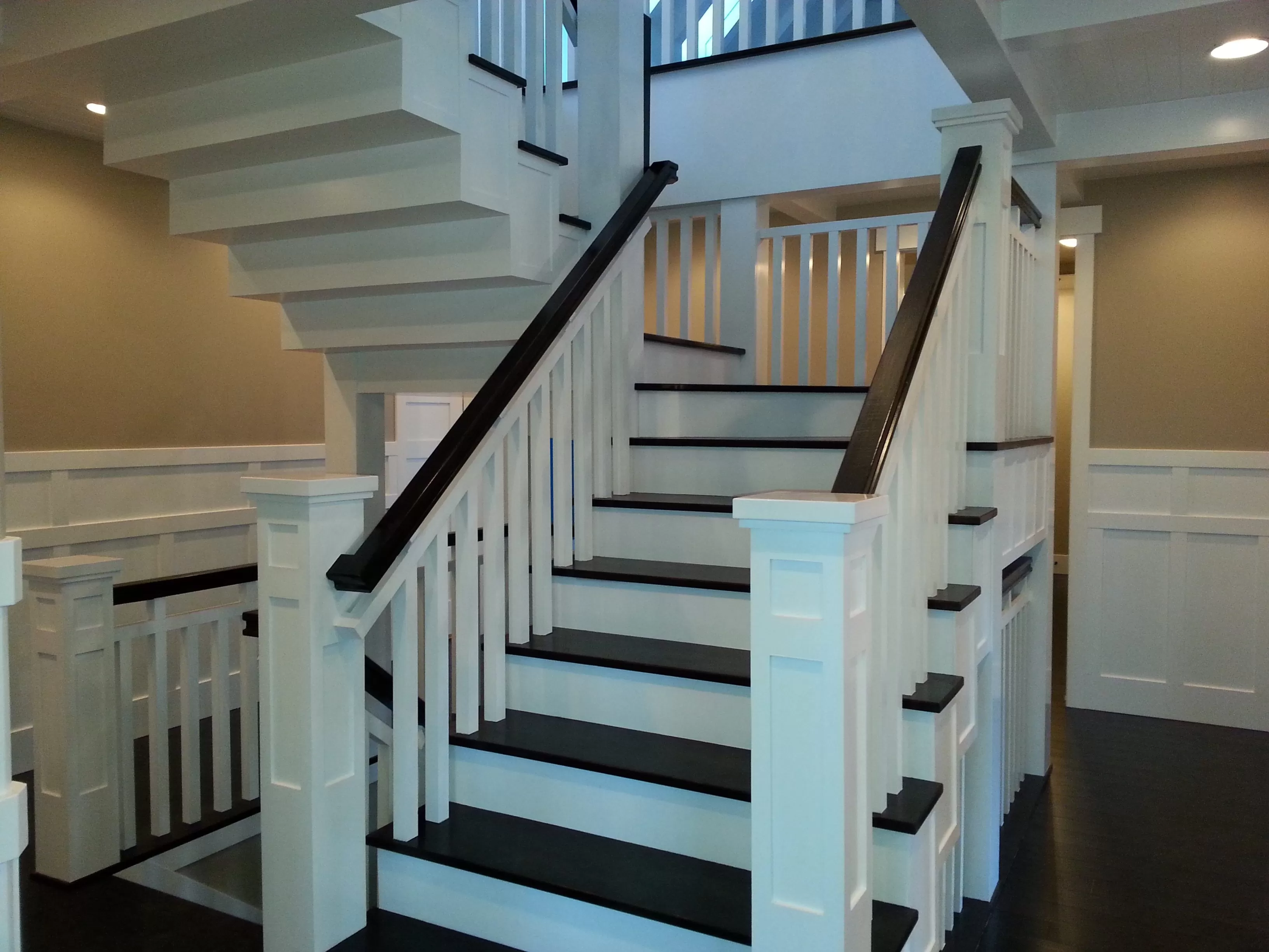 Custom Staircase in Custom Sandy Rambler with Bonus room by Lightyear Homes in Sandy, City, Utah